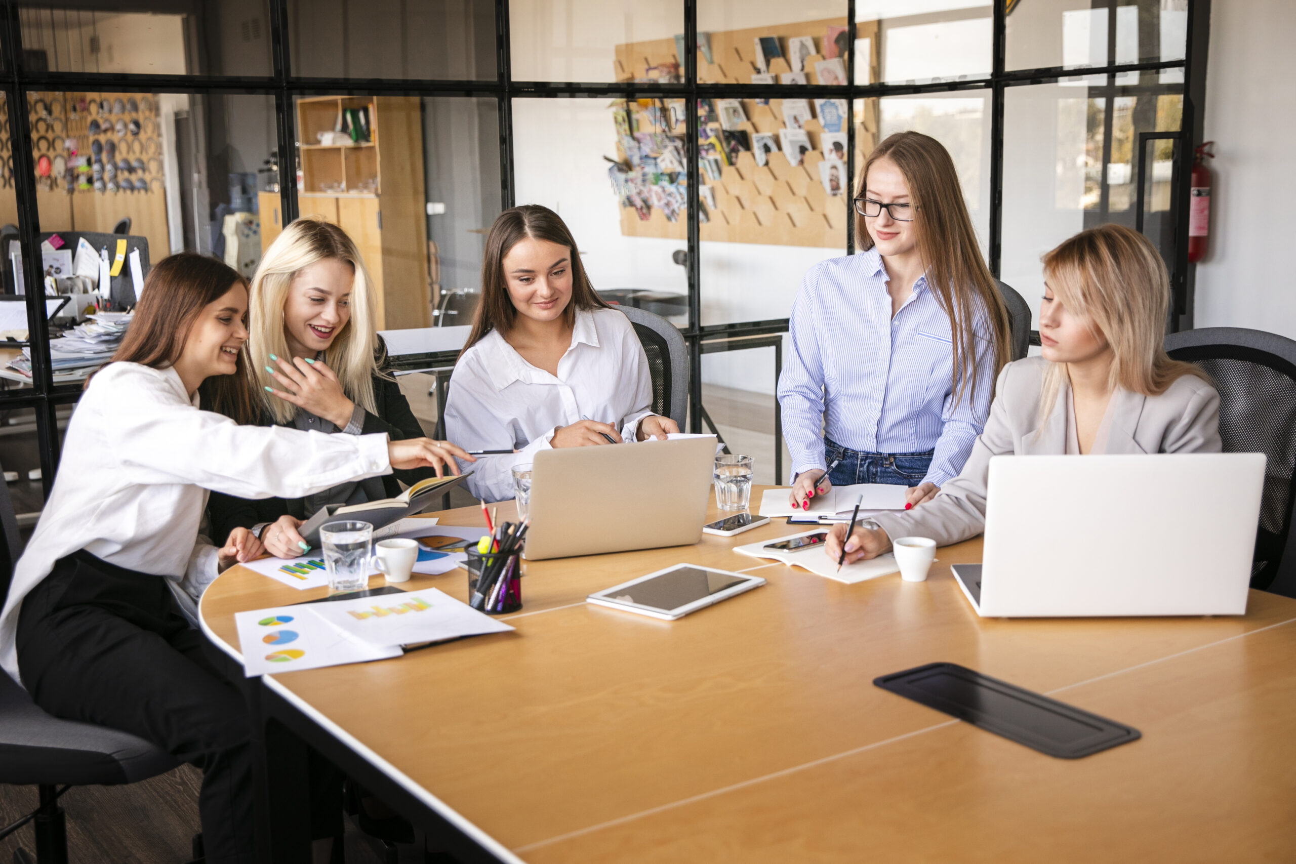 high-angle-women-meeting-work